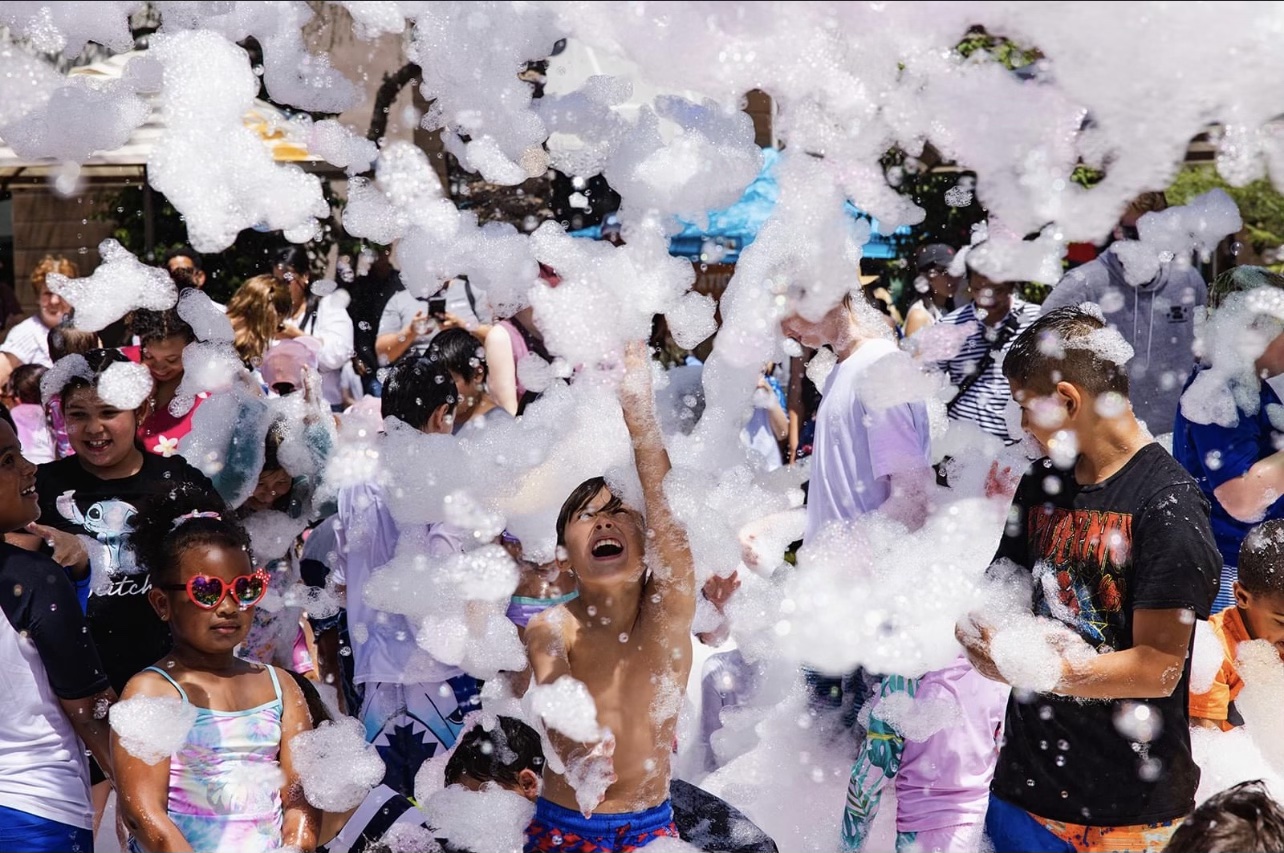 Kids having a blast at a foam party